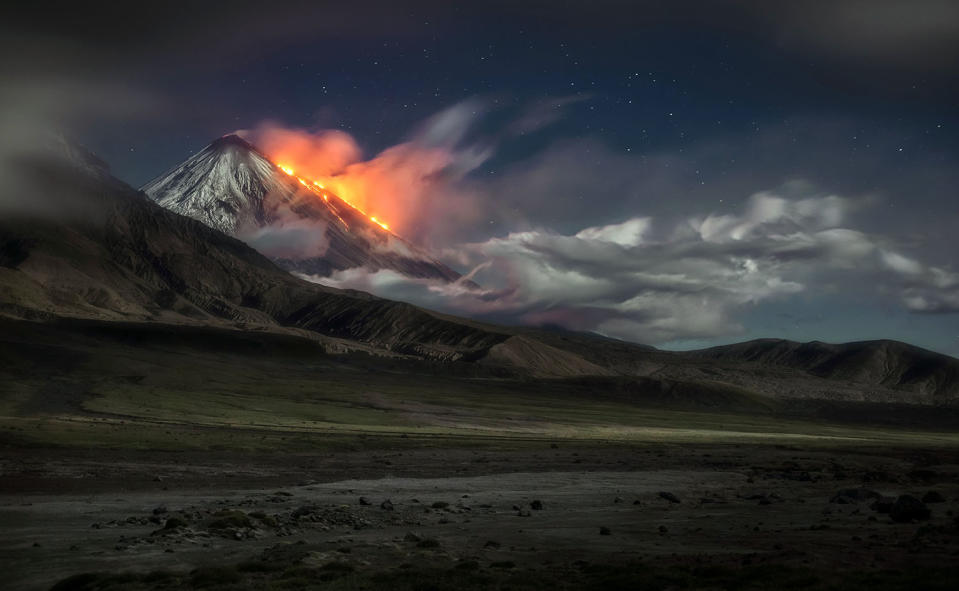 Stunning images capture ‘UFO’ clouds surrounding volcano 