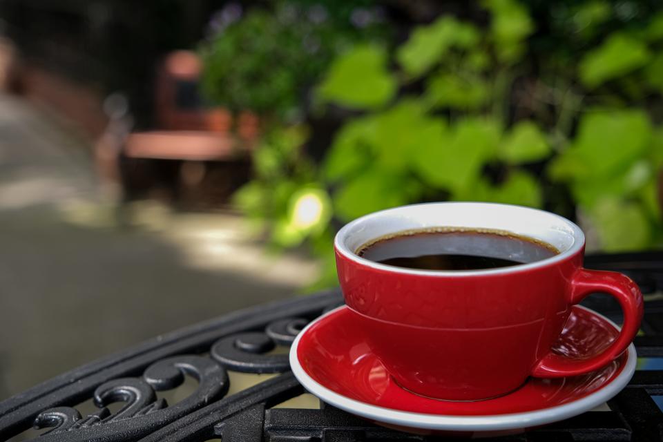 A cup of coffee at the outside courtyard of Foxy Loxy Cafe.