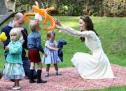 <p>Prince George and his sister Charlotte <a href="https://www.townandcountrymag.com/society/tradition/a8023/princess-charlotte-balloons/" rel="nofollow noopener" target="_blank" data-ylk="slk:loved playing with the balloons;elm:context_link;itc:0;sec:content-canvas" class="link ">loved playing with the balloons</a> at a children's party for military families in Victoria. </p>
