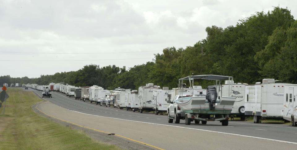 Recreational trailers and boats are parked along LA-46 inside the levee gates in anticipation of Tropical Storm Cristobal in St. Bernard Parish, La., Saturday, June 6, 2020. A re-energized Tropical Storm Cristobal advanced toward the U.S. Gulf Coast early Saturday, bringing with it the heavy rains that already caused flooding and mudslides in Mexico and Central America. (Max Becherer/The Times-Picayune/The New Orleans Advocate)