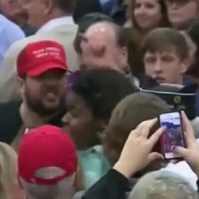 Matthew Heimbach, the bearded man in the MAGA cap, shoves an African American protester at a Trump rally in Louisville, Kentucky, in 2016. Heimbach later pleaded guilty to disorderly conduct. (Photo: Reuters)