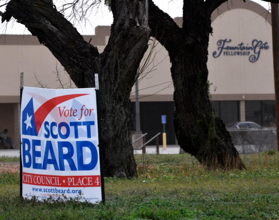 A sign for Scott Beard is displayed in a vacant lot with Beard’s church, FountainGate Fellowship, in the lot beside this one March 16. Beard is the pastor.