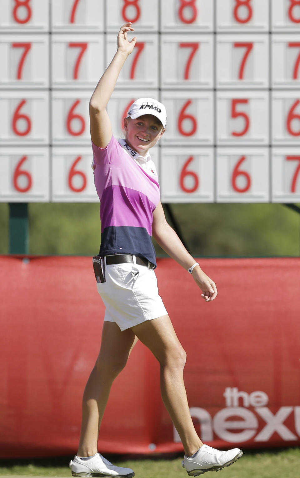 Stacy Lewis waves after winning the North Texas LPGA Shootout golf tournament at Las Colinas Country Club in Irving, Texas, Sunday, May 4, 2014. (AP Photo/LM Otero)