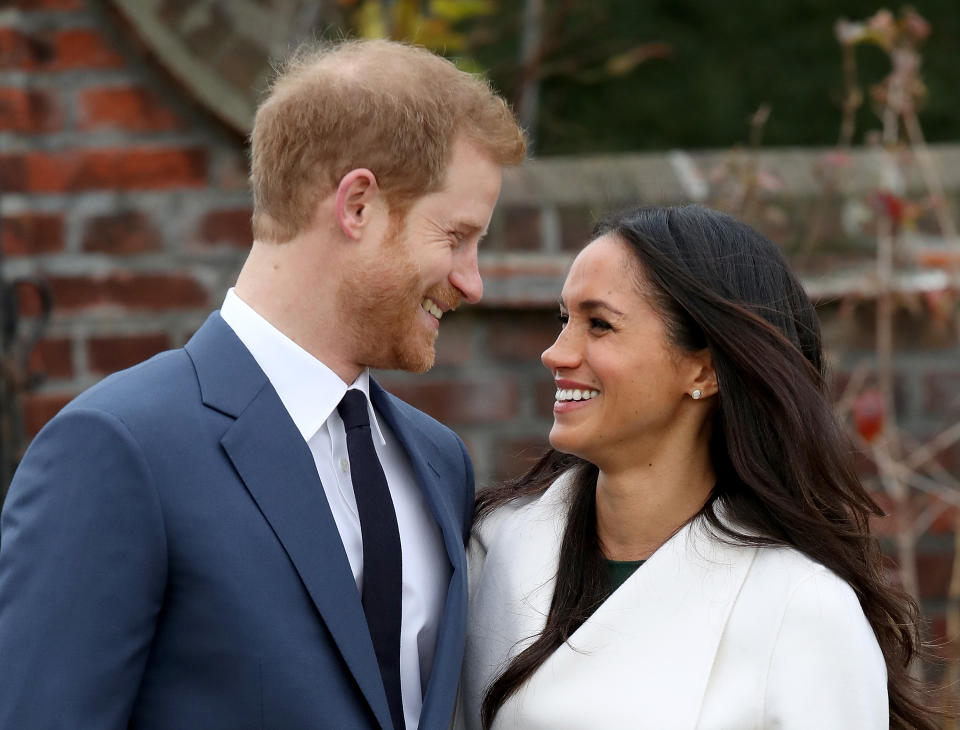 LONDON, ENGLAND - NOVEMBER 27:  Prince Harry and actress Meghan Markle during an official photocall to announce their engagement at The Sunken Gardens at Kensington Palace on November 27, 2017 in London, England.  Prince Harry and Meghan Markle have been a couple officially since November 2016 and are due to marry in Spring 2018.  (Photo by Chris Jackson/Chris Jackson/Getty Images)