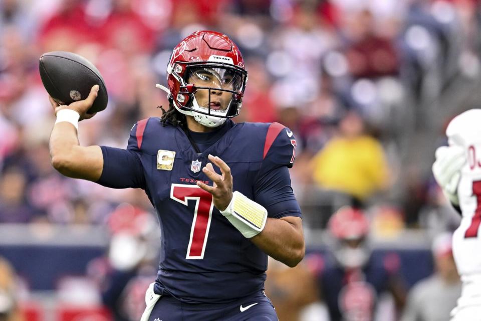 Houston Texans quarterback C.J. Stroud (7) sets to throw against the Arizona Cardinals.