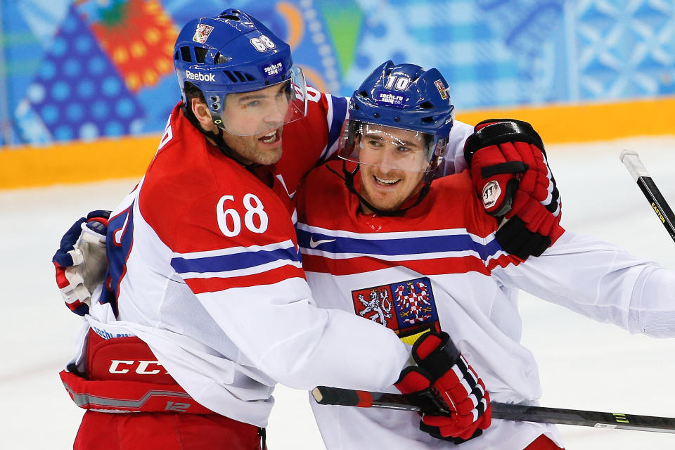 Czech Republic forward Roman Cervenka, right, celebrates his goal with forward Jaromir Jagr during the first period of the 2014 Winter Olympics men's ice hockey game against Slovakia at Shayba Arena, Tuesday, Feb. 18, 2014, in Sochi, Russia. (AP Photo/Petr David Josek)