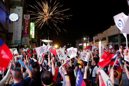 Fireworks released by supporters of Opposition Nationalist Kuomintang Party (KMT) Kaohsiung mayoral candidate Han Kuo-yu celebrate as their candidate announces a leading trend during local elections in the poll, in Kaohsiung, Taiwan November 24, 2018. REUTERS/Tyrone Siu