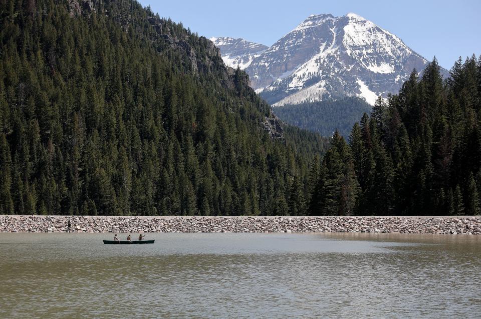 Sydney Veirig, Sage Leatherberry and Scarlett Openshaw canoe in front of the dam on Tibble Fork Reservoir in American Fork Canyon on Tuesday, May 30, 2023. | Kristin Murphy, Deseret News