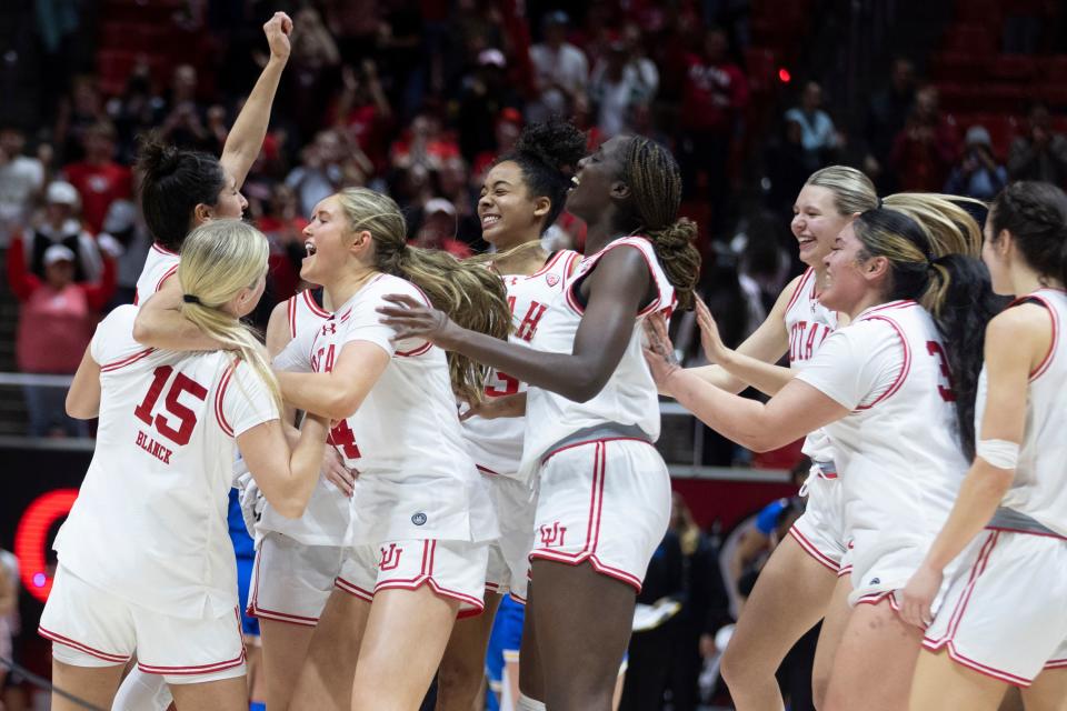 The Utah Utes celebrate a win in overtime against the UCLA Bruins at the Huntsman Center in Salt Lake City on Jan. 22, 2024. The final score was 94-81.