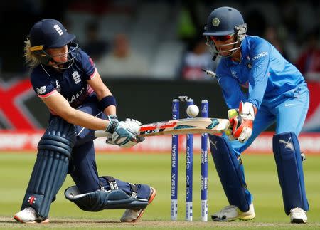 Cricket - Women's Cricket World Cup Final - England vs India - London, Britain - July 23, 2017 England's Lauren Winfield hits the ball into her wicket Action Images via Reuters/Andrew Couldridge