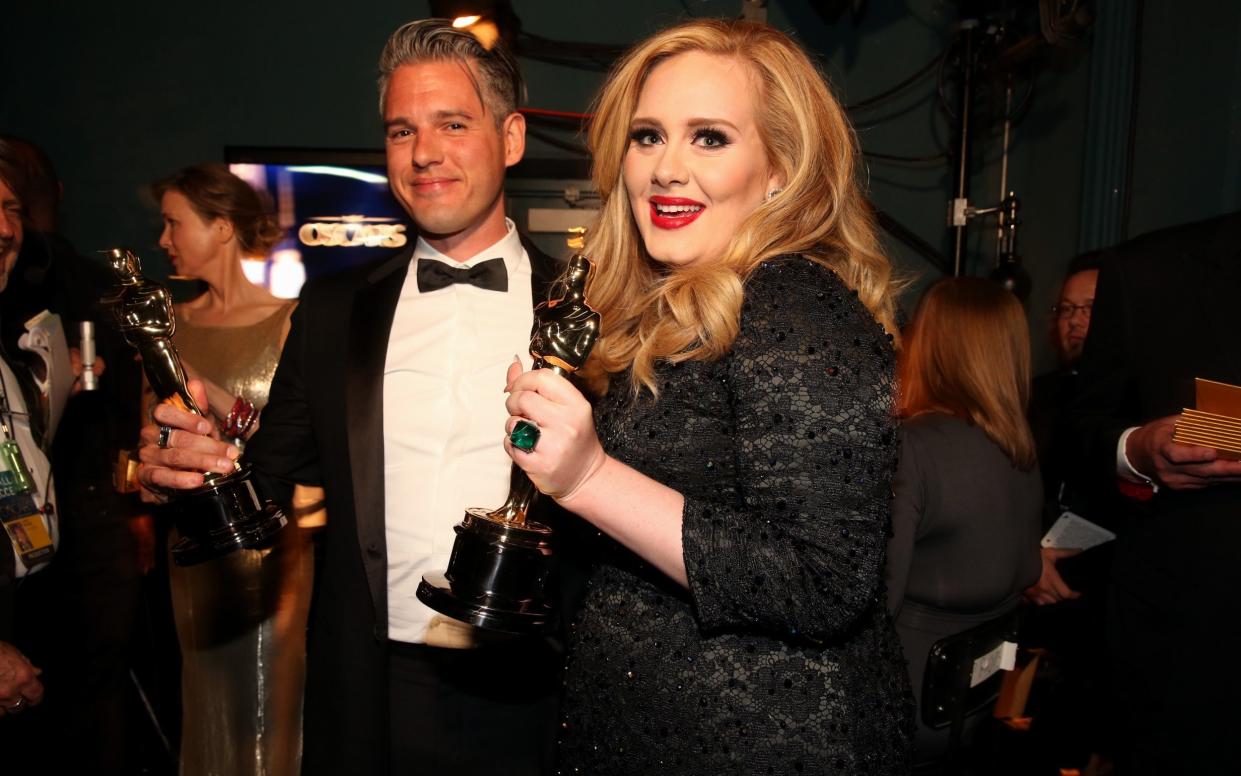 Paul Epworth (left) and Adele were winners of the Best Original Song Oscar for the title song of 'Skyfall' in 2013 - Christopher Polk/Getty Images North America