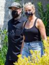 <p>Cameron Diaz and husband Benji Madden step out to view a home in Los Angeles on Sunday. </p>