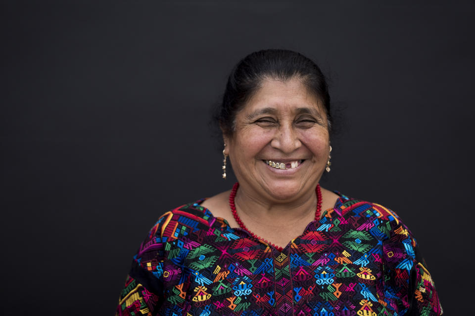 María Rosita Yoc Suruy poses for portraits in San Juan Comalapa, Guatemala, Tuesday, June 20, 2023. The 56-year-old homemaker said she planned to vote in the presidential race on June 25, though she had not entirely decided who to vote for. (AP Photo/Moises Castillo)