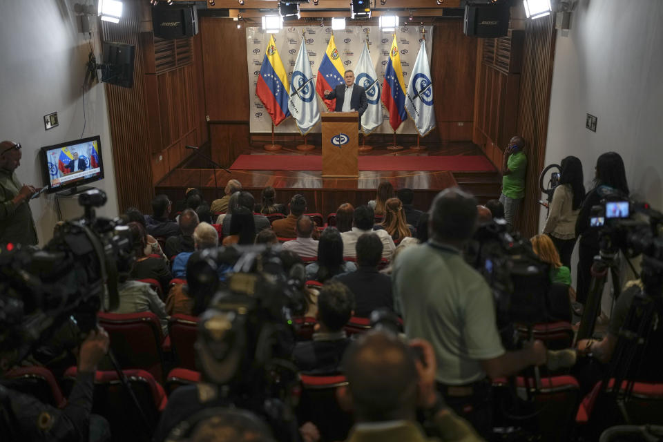 Venezuelan Attorney General Tarek William Saab holds a news conference about corruption cases with the state run oil company, PDVSA, in Caracas, Venezuela, Saturday, March 25, 2023. Venezuela's oil czar, Tareck El Aissami, who announced his resignation on Twitter on Monday, March 20, 2023, pledged to help investigate any allegations involving PDVSA. (AP Photo/Matias Delacroix)