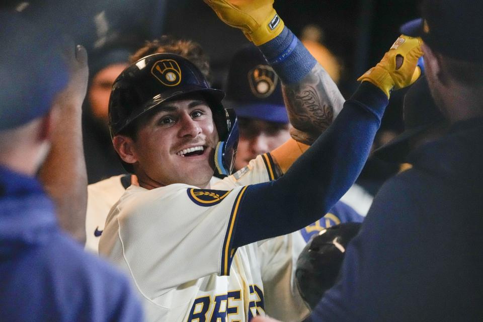 Milwaukee Brewers' Joey Ortiz is congratulated after hitting a two-run home run during the second inning of a baseball game against the New York Yankees Friday, April 26, 2024, in Milwaukee. (AP Photo/Morry Gash)