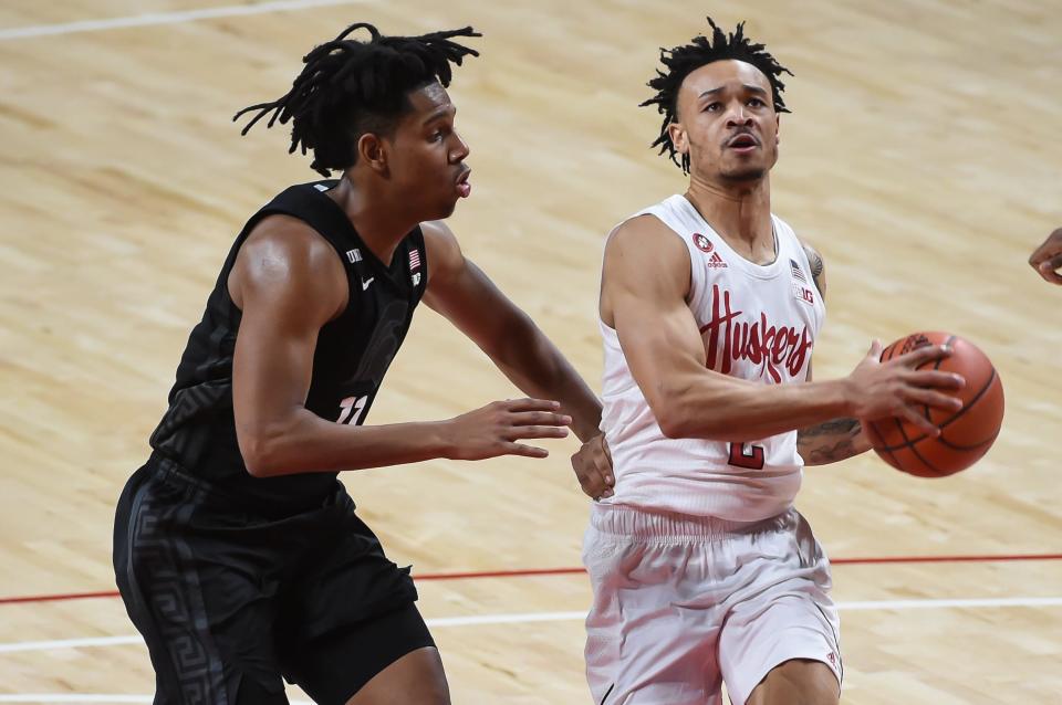 Nebraska Cornhuskers guard Trey McGowens (2) drives by Michigan State Spartans guard A.J. Hoggard (11) in the second half Jan. 2, 2021, at Pinnacle Bank Arena in Nebraska.