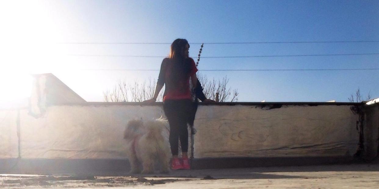 Samar with her dog, Nikki, in Iran.