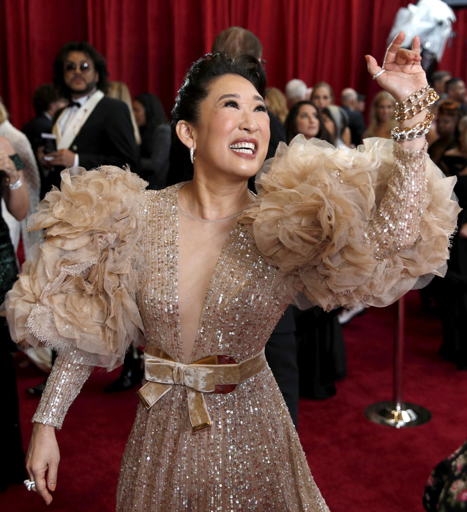 FILE- In this Feb. 9, 2020, file photo, Sandra Oh arrives at the Oscars in Los Angeles. Oh turns 49 on July 20. (AP Photo/John Locher, File)