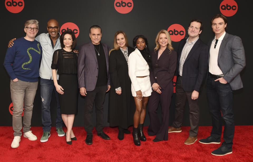 This image released by ABC shows, from left, co-head writer Chris Van Etten, and actors Donnell Turner, Rebecca Herbst, Maurice Bernard, Genie Francis, Tabyana Ali, Kristina Wagner co-head writer Dan O'Connor and actor Nicholas Chavez from "General Hospital" at the ABC Winter TCA Press Tour in Pasadena, Calif., on Jan. 11, 2023. The popular daytime series marks its 60th anniversary this week, making it the longest-running scripted show currently in production on American television. (ABC via AP)