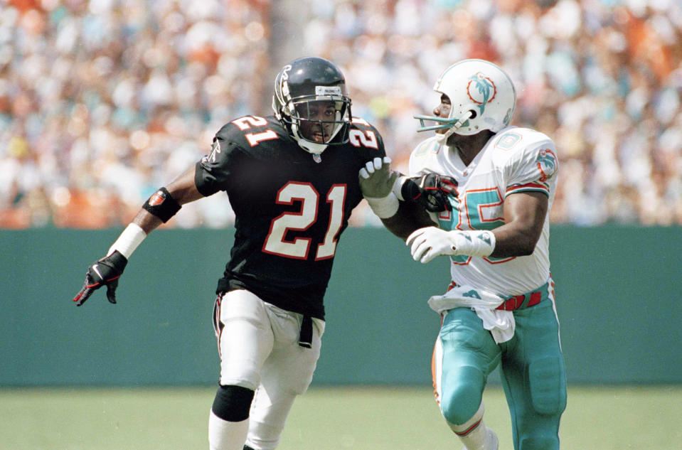 Atlanta Falcons defensive back Deion Sanders covers Miami Dolphins wide receiver Mark Duper during a game at the Orange Bowl, Oct. 11, 1992. (AP Photo)