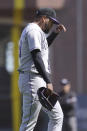 Colorado Rockies pitcher German Marquez walks toward the dugout after being relieved during the sixth inning of a baseball game against the San Francisco Giants in San Francisco, Sunday, April 11, 2021. (AP Photo/Jeff Chiu)