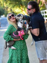 <p>Tori Spelling gets sweet kisses from her dogs while out for a walk with husband Dean McDermott on Monday in L.A.</p>