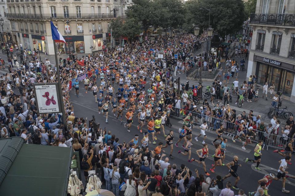 Amateur runners race like Olympians along the same iconic route as