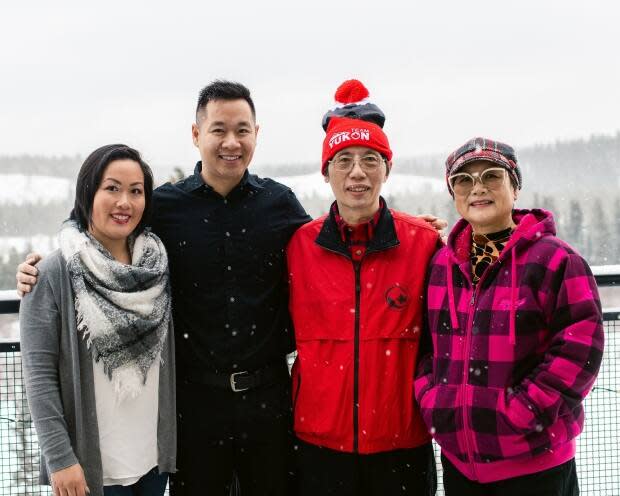 Mellisa Murray, left, with her family in Whitehorse. Murray's parents are from Hong Kong and she says growing up in Whitehorse she never fully understood what racism was even as she experienced it. (Submitted by Mellisa Murray - image credit)