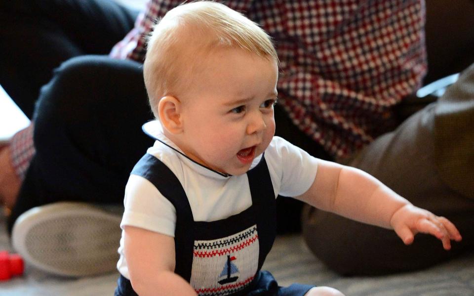 Prince George wearing the Sailboat Smocked Dungarees in New Zealand in 2014 - James Whatling/Reuters