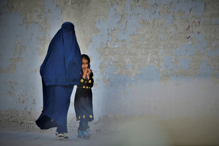 Afghanistan's supreme leader and Taliban chief Hibatullah Akhundzada decreed that women must cover fully in public, including their faces, or stay indoors (AFP/Ahmad SAHEL ARMAN)