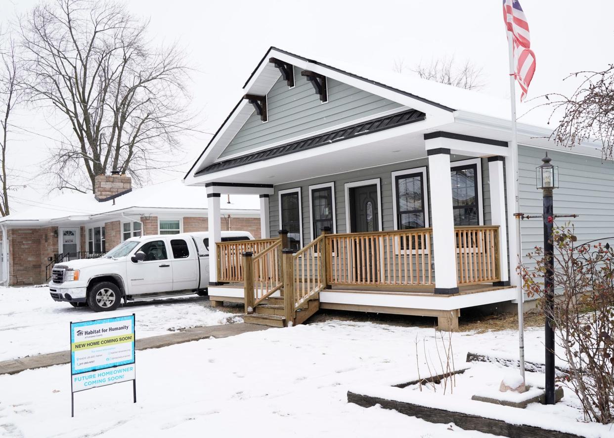 Habitat for Humanity of Lenawee County welcomed its new homeowners to their house during a ceremony last week in Adrian. Jacob Trentman and Hannah Phair will soon reside at this house in Adrian at 943 Treat St. A ribbon cutting and home dedication for the couple was held Monday, Nov. 27, 2023.