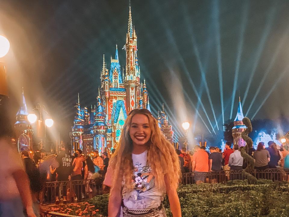 kayleigh price in front of happily ever after at magic kingdom