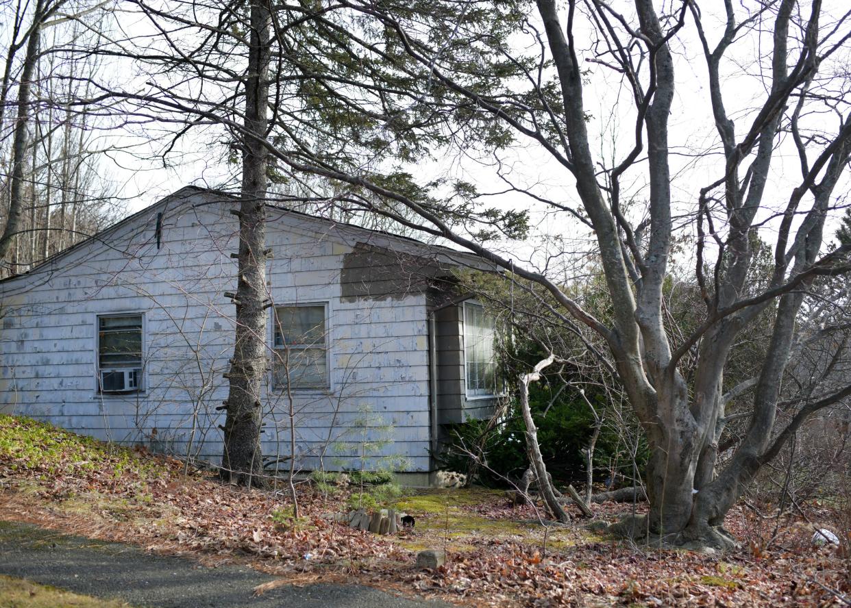 The house at 8 Sussex Lane where two people were discovered dead on Monday. The cause of the deaths remains under investigation.