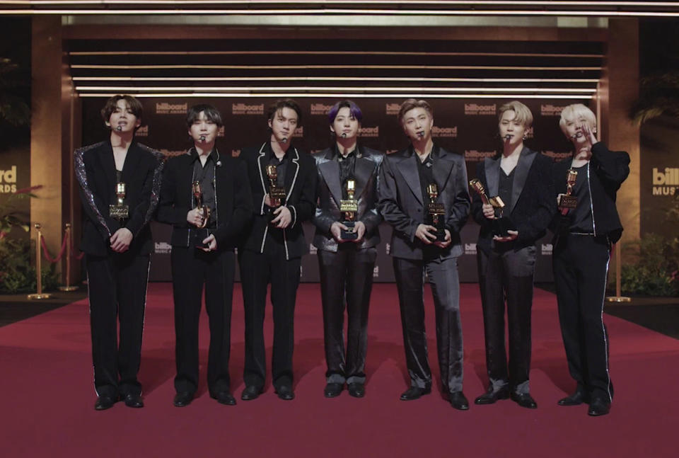 In this video image provided by NBC, BTS accepts the top selling song award for "Dynamite" during the Billboard Music Awards on Sunday, May 23, 2021. (NBC via AP)