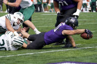 Northwestern running back Jake Arthurs, right, scores a touchdown past Ohio linebacker Ben Johnson, left, and linebacker Jack McCrory during the second half of an NCAA college football game in Evanston, Ill., Saturday, Sept. 25, 2021. Northwestern won 35-6. (AP Photo/Nam Y. Huh)