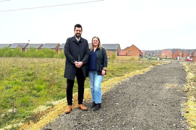 Martin Thrumble, Technical Director of Persimmon North East and resident Julia Dowd on the new footpath for the Fairways and Arcot Manor estates in Cramlington