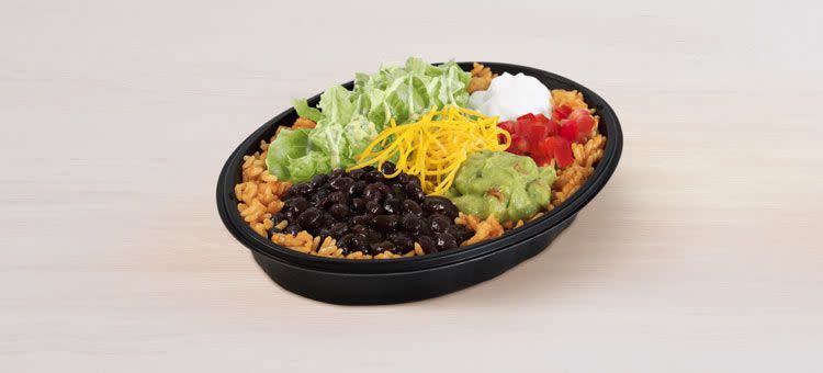 a black bowl with food in it