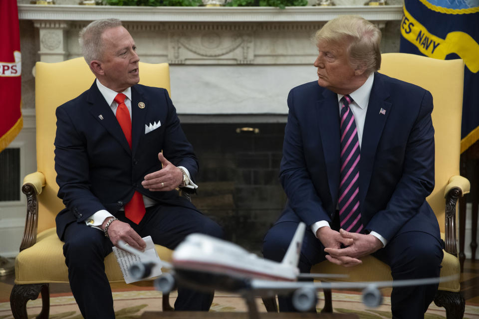 FILE - In this Dec. 19, 2019 photo, President Donald Trump, right, meets with Rep. Jeff Van Drew in the Oval Office of the White House in Washington. Trump is coming next week to the Jersey shore to reward newly minted Republican Rep. Jeff Van Drew for leaving the Democrats and opposing impeachment and is expected to attract a crowd and headlines. But Van Drew has also been crisscrossing the district to secure support from local GOP that he spent years fighting. (AP Photo/ Evan Vucci, File)