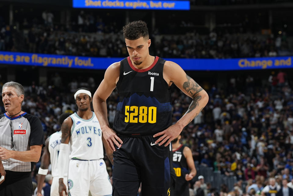 Denver Nuggets forward Michael Porter Jr. reacts as time runs out in the second half of Game 7 of an NBA second-round playoff series against the Minnesota Timberwolves, Sunday, May 19, 2024, in Denver. (AP Photo/David Zalubowski)