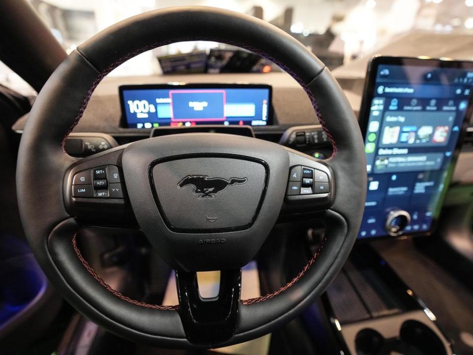  The cockpit of a Ford Mustang Mach-E electric car is pictured at the Motor Show in Essen, Germany.