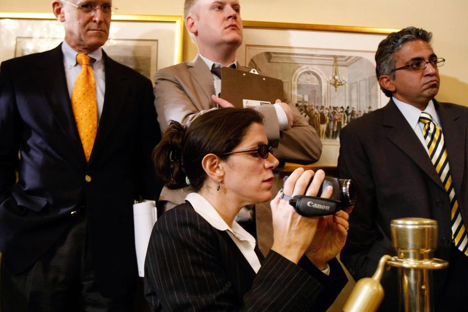 WASHINGTON - MAY 22: Documentary filmmaker Alexandra Pelosi (C) films her mother, Speaker of the House Nancy Pelosi (D-CA), during a news conference at the U.S. Capitol May 22, 2009 in Washington, DC. Pelosi turned the news conference into an opportunity to list what she and the Democratic House leadership considered their successes of the 111th Congress' first session. She took a handful of questions about her upcomming trip to China and her statements about the CIA. (Photo by Chip Somodevilla/Getty Images)