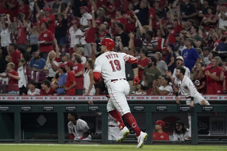 Cincinnati Reds' Joey Votto (19) rounds the bases after hitting a two-run home run during the fifth inning of a baseball game against the Miami Marlins, Friday, Aug. 20, 2021, in Cincinnati. (AP Photo/Jeff Dean)