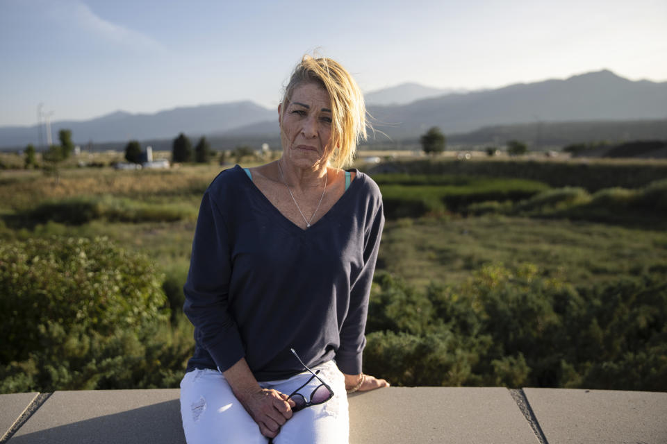 Kandy Fuelling poses for a portrait in Colorado Springs, Colo. on Sunday, August 20, 2023. Fuelling was badly injured while working a prison work release job at a saw mill in Pueblo, Colo.. (AP Photo/Robert Bumsted)