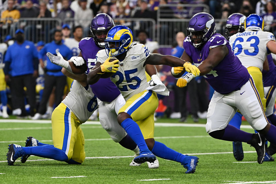 MINNEAPOLIS, MINNESOTA - DECEMBER 26: Sony Michel #25 of the Los Angeles Rams runs with the ball in the first quarter against the Minnesota Vikings during the first quarter at U.S. Bank Stadium on December 26, 2021 in Minneapolis, Minnesota. (Photo by Stephen Maturen/Getty Images)