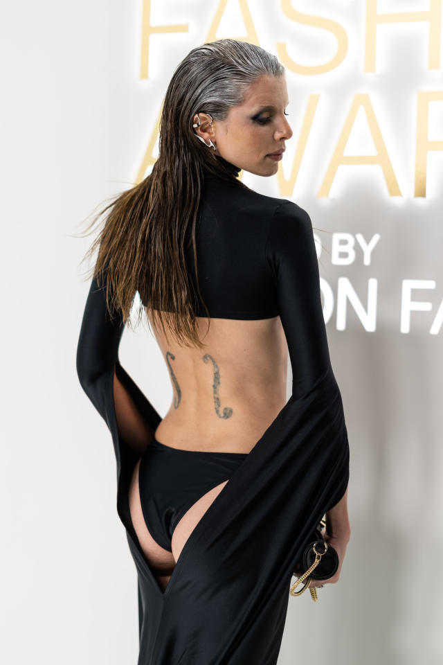 Julia Fox turns heads in midriff-baring underwear exposing dress