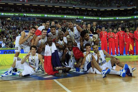 France players celebrate with their trophy after winning their European championship basketball final against Lithuania in Ljubljana's Arena Stozice September 22, 2013. REUTERS/Antonio Bronic