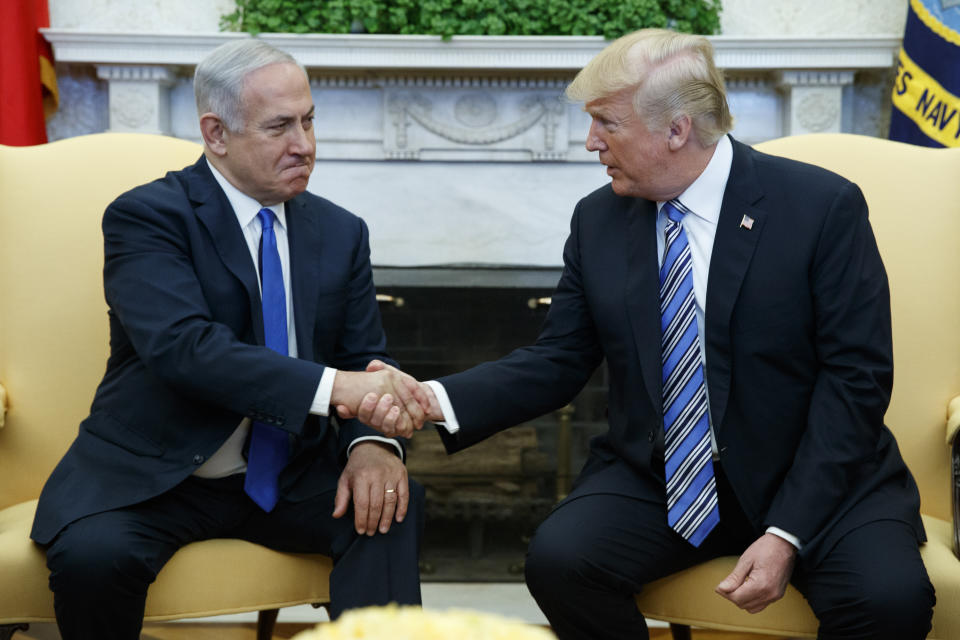 FILE - In this March 5, 2018, file photo, President Donald Trump meets with Israeli Prime Minister Benjamin Netanyahu in the Oval Office of the White House in Washington. Trump and Netanyahu have had a mutually beneficial relationship unlike perhaps that of any previous leader of either country, with Trump’s surprise recognition of Israel’s sovereignty over the Golan Heights just the most recent example. Trump’s precedent-breaking steps have boosted his own profile with pro-Israel groups in the U.S. and given a boost to Netanyahu at the height of campaigning in the unexpectedly tense Israeli election. (AP Photo/Evan Vucci, File)