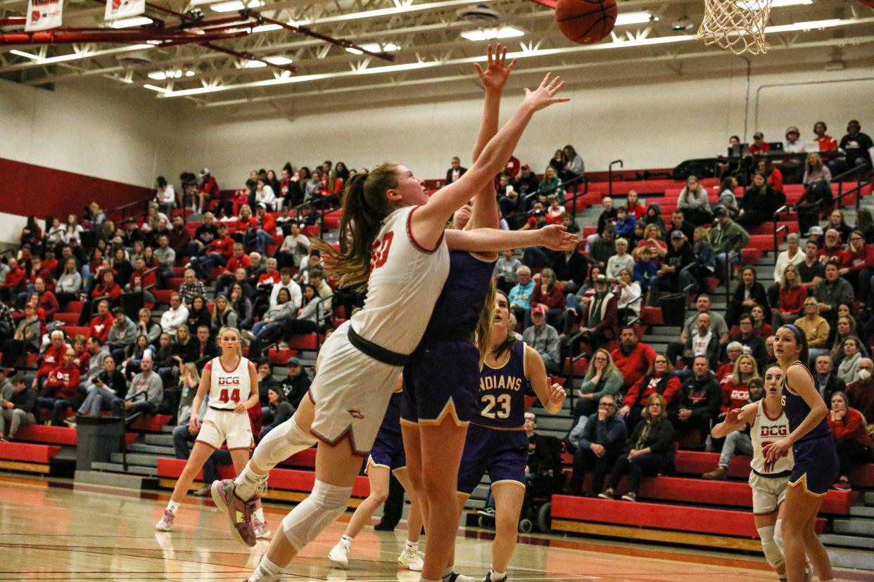 DCG's Emma Miner puts up a shot against Indianola on Friday, Jan. 6, 2023, in Grimes.