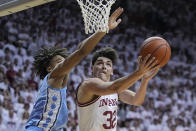 Indiana's Trey Galloway (32) shoots against North Carolina's Seth Trimble during the second half of an NCAA college basketball game, Wednesday, Nov. 30, 2022, in Bloomington, Ind. (AP Photo/Darron Cummings)