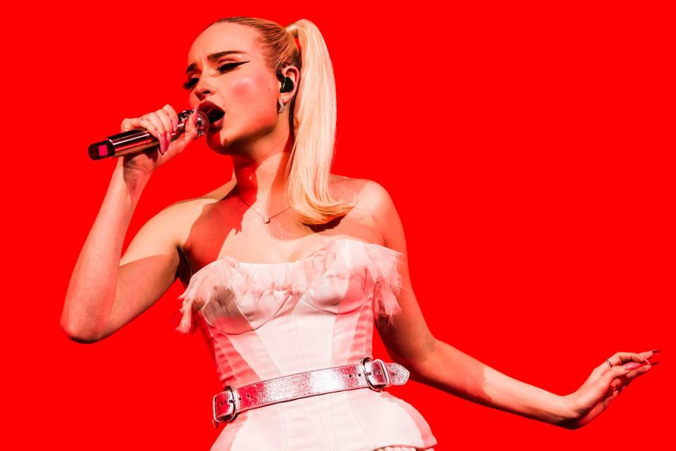 <p>Gina Wetzler/Redferns</p> Kim Petras performs in Berlin in March 2024